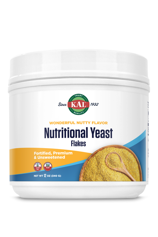 A white kalvitamins Nutritional Yeast Flakes container with a yellow label, showing a bowl and wooden spoon of unsweetened flakes, and text highlighting fortified yeast, premium quality, and a nutty flavor.