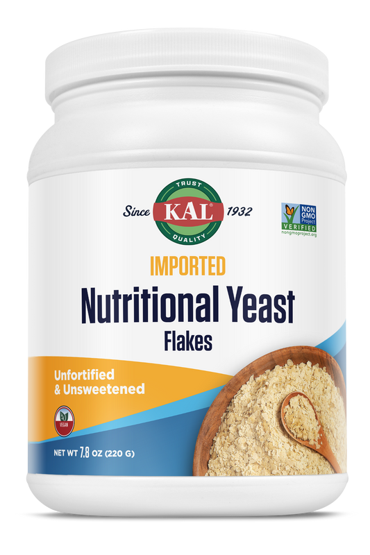 A white container of kalvitamins Nutritional Yeast Fine Flakes, unfortified and unsweetened, rich in plant protein, with flakes and a wooden spoon on the front. Net weight: 7.8 oz (220 g).